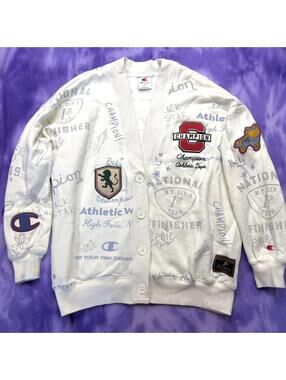 Champion cardigan with allover print and patches / letters